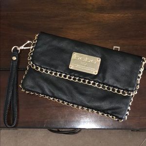 Bebe black clutch with gold